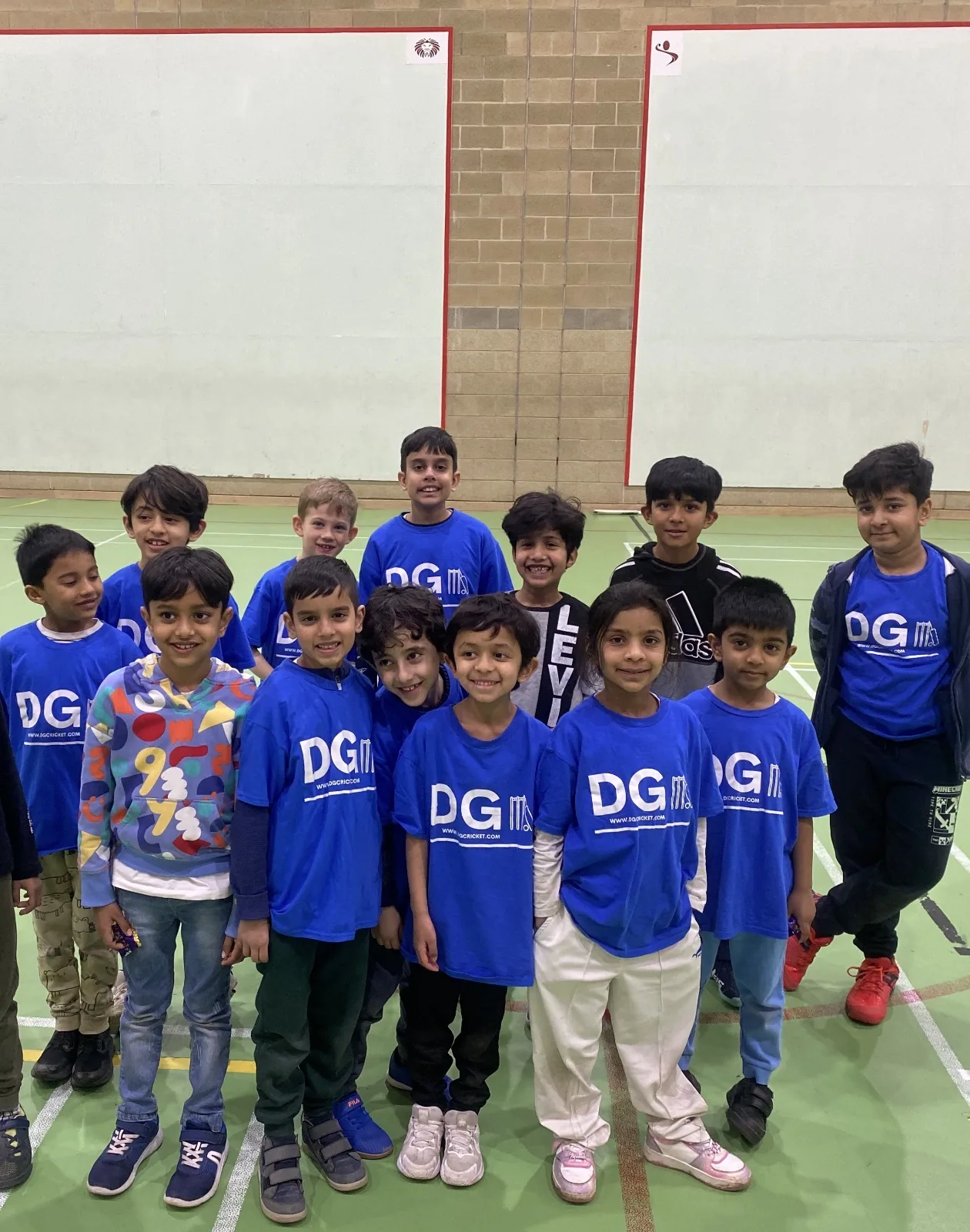 DG Cricket academy group wearing DG shirts