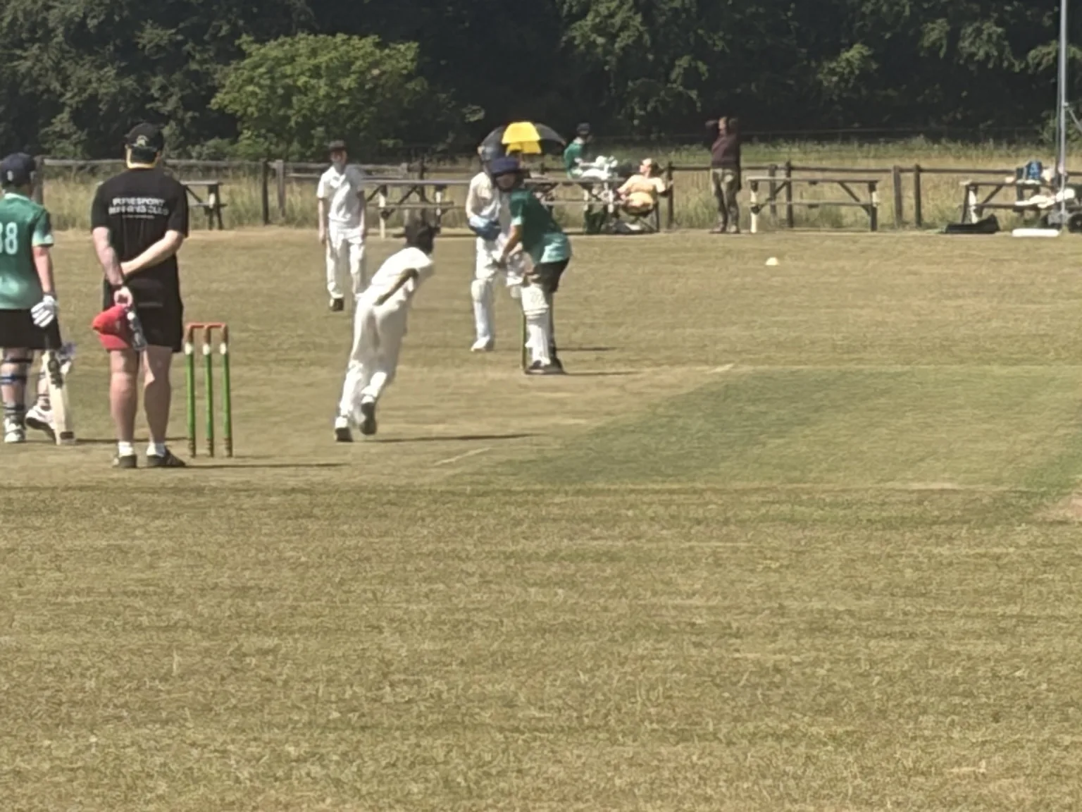 Junior cricket match action